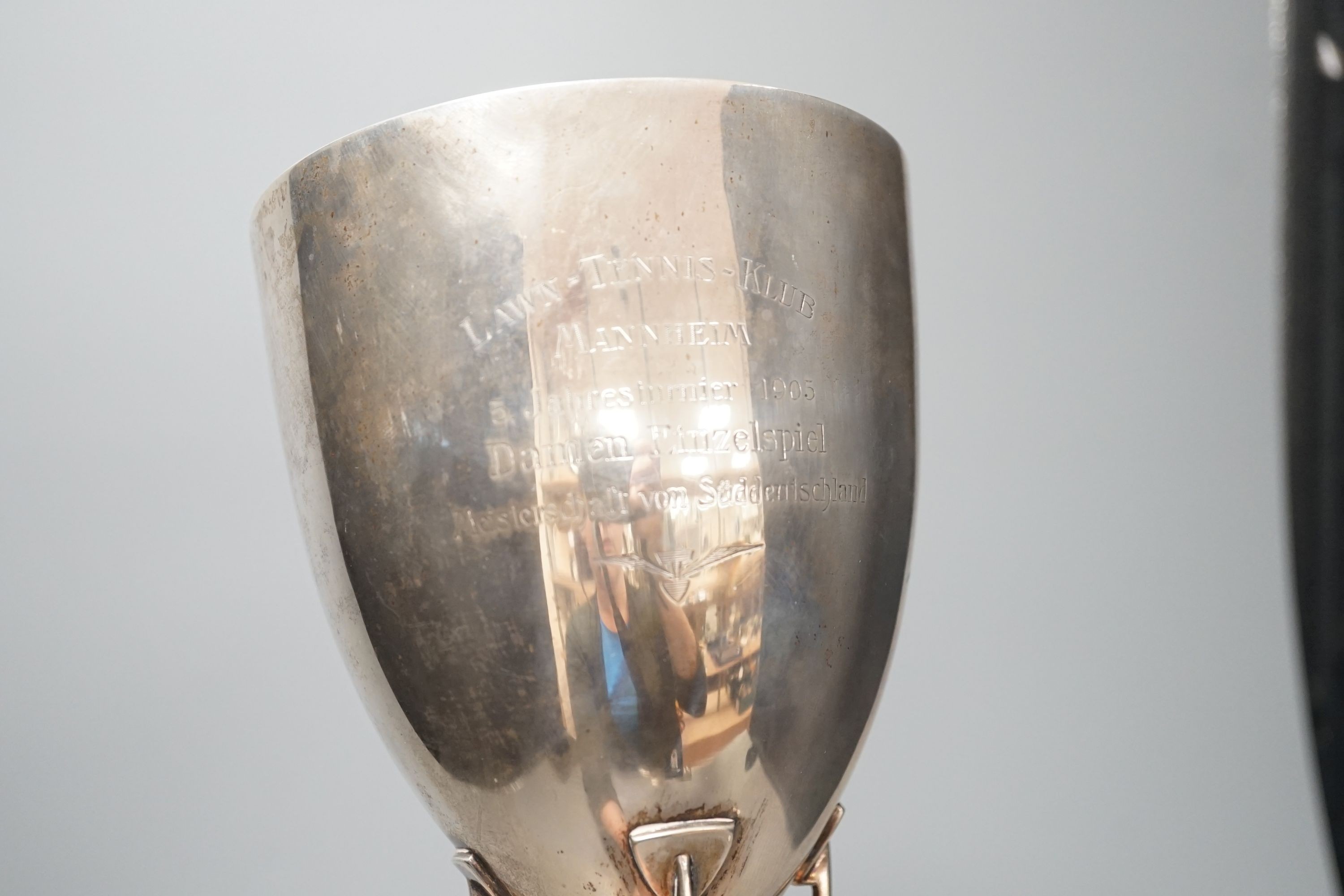 A stylish early 20th century German 800 standard white metal presentation trophy cup, with engraved inscription dated 1905, indistinct makers mark, height 42,1cm, 22oz.